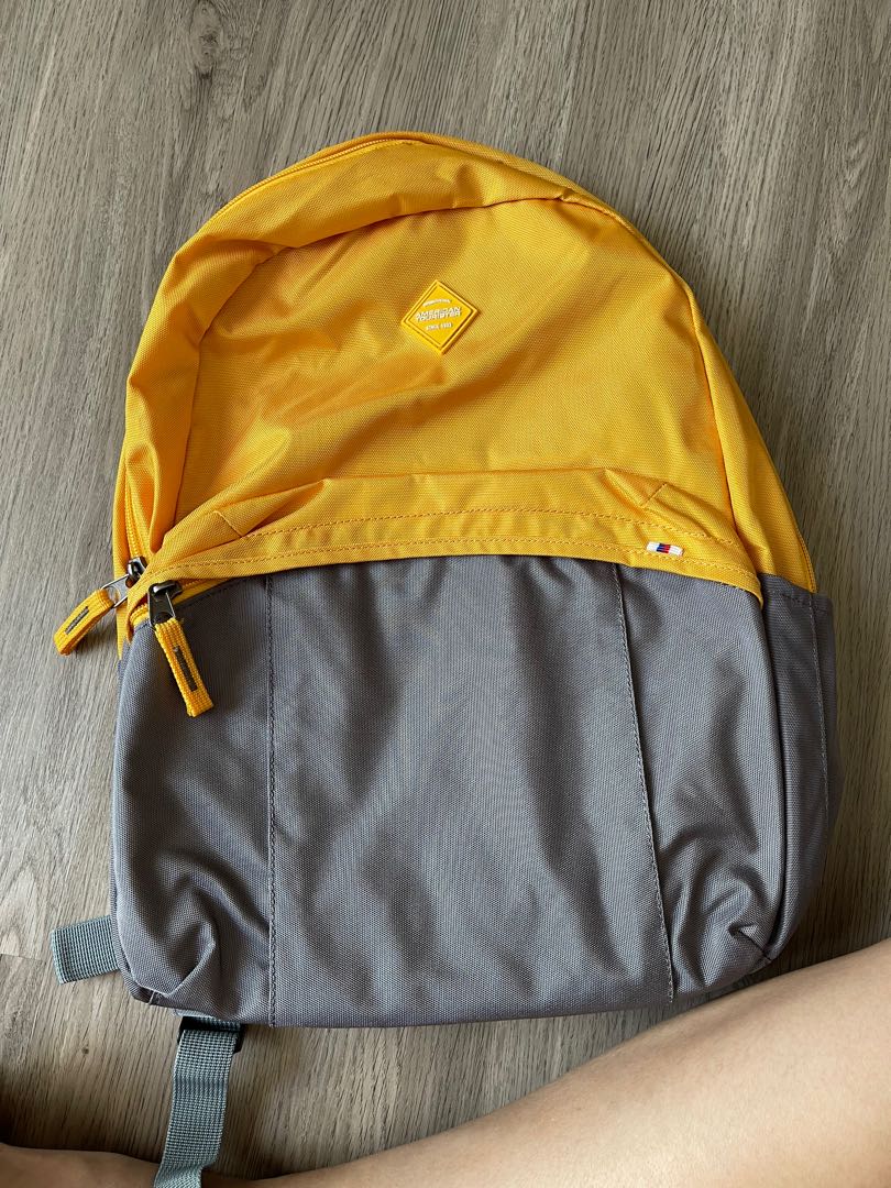 American tourister deals backpack yellow