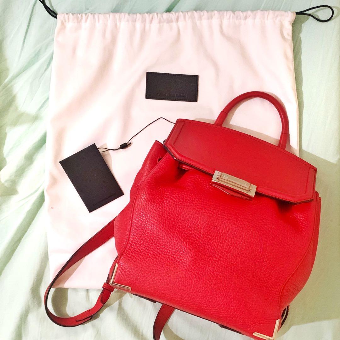 Authentic Alexander Wang Red Leather Prisma Backpack (Category: Luxury Bags & Wallets) located in Makati City. Submitted by random.objects (Listing ID 1168870374, Image 2). Description: Authentic Alexander Wang Red Leather Prisma Skeletal Mini Backpack - Red pebbled leather body, smooth leather flap - Hidden pocket at the back (photo 3), pocket inside (photo 4) - With top handle and adjustable straps (photo 5) - Fully lined - Retails for $800+ / 