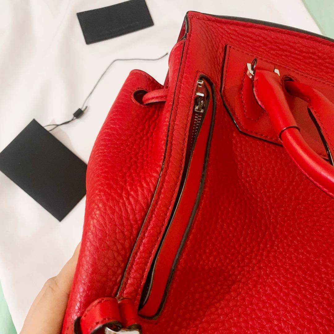 Authentic Alexander Wang Red Leather Prisma Backpack (Category: Luxury Bags & Wallets) located in Makati City. Submitted by random.objects (Listing ID 1168870374, Image 3). Description: Authentic Alexander Wang Red Leather Prisma Skeletal Mini Backpack - Red pebbled leather body, smooth leather flap - Hidden pocket at the back (photo 3), pocket inside (photo 4) - With top handle and adjustable straps (photo 5) - Fully lined - Retails for $800+ / 