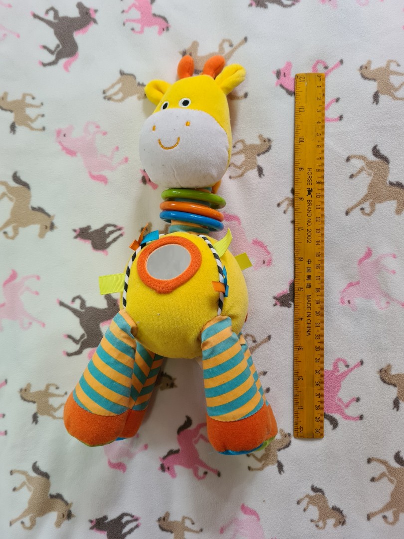 CARTER'S toy giraffe with bells, mirror and rings for sensory play