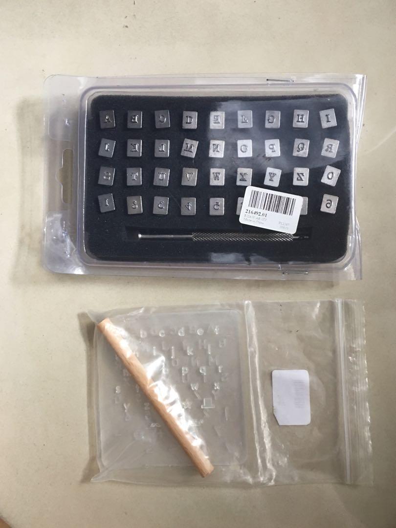Letter Stamps for Leatherette (Category: Craft Supplies & Tools) located in Dagupan City. Submitted by gamitnimoi (Listing ID 1168892595, Image 1). Description: Selling these alphabet stamps for leatherette as a set. Metal stamps has capital serif letters and numbers. Plastic set has uppercase and lowercasw sans serif letters, numbers and symbols. Used only for 1 project so some of the letters have not even been used. Issues: -Wooden dowel in the