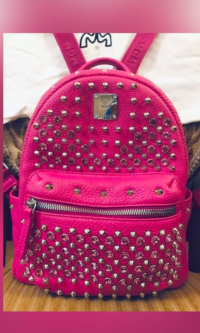 Hot pink mcm backpack shop