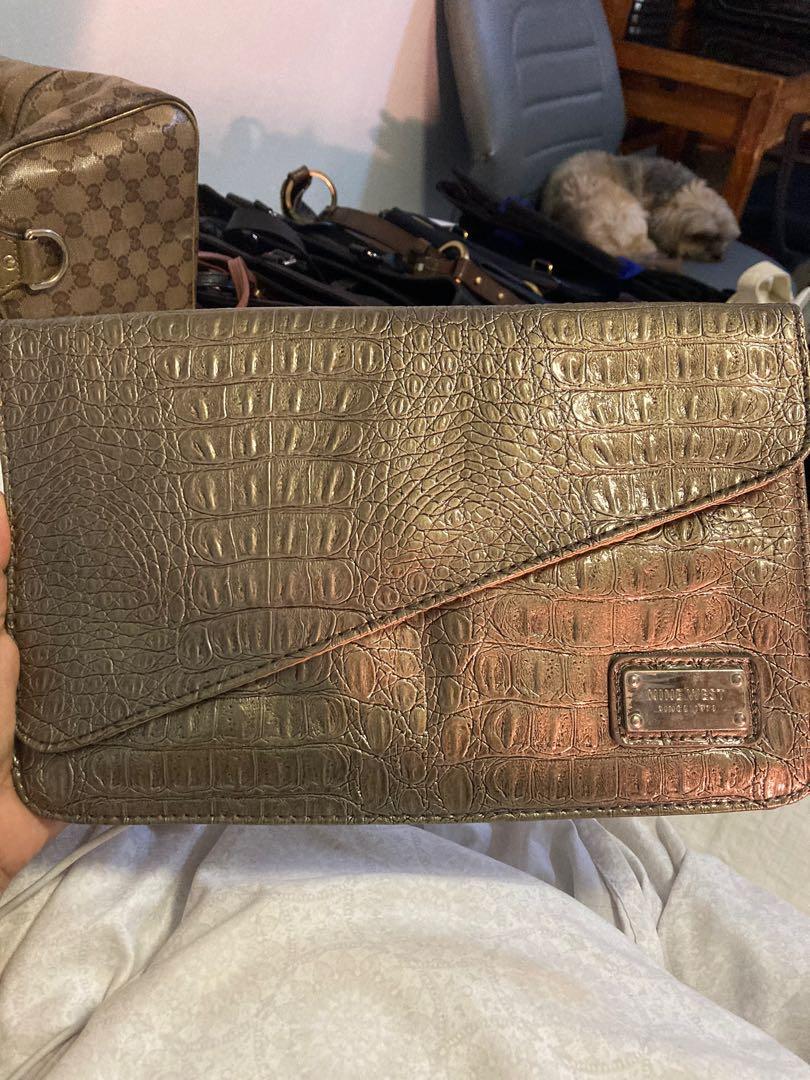 Orig. NINE WEST night bag (Category: Clutches) located in Quezon City. Submitted by Lilac (Listing ID 1168884832, Image 2). Description: Laminated & well maintained. Beautiful color & design. Very fashionable. .