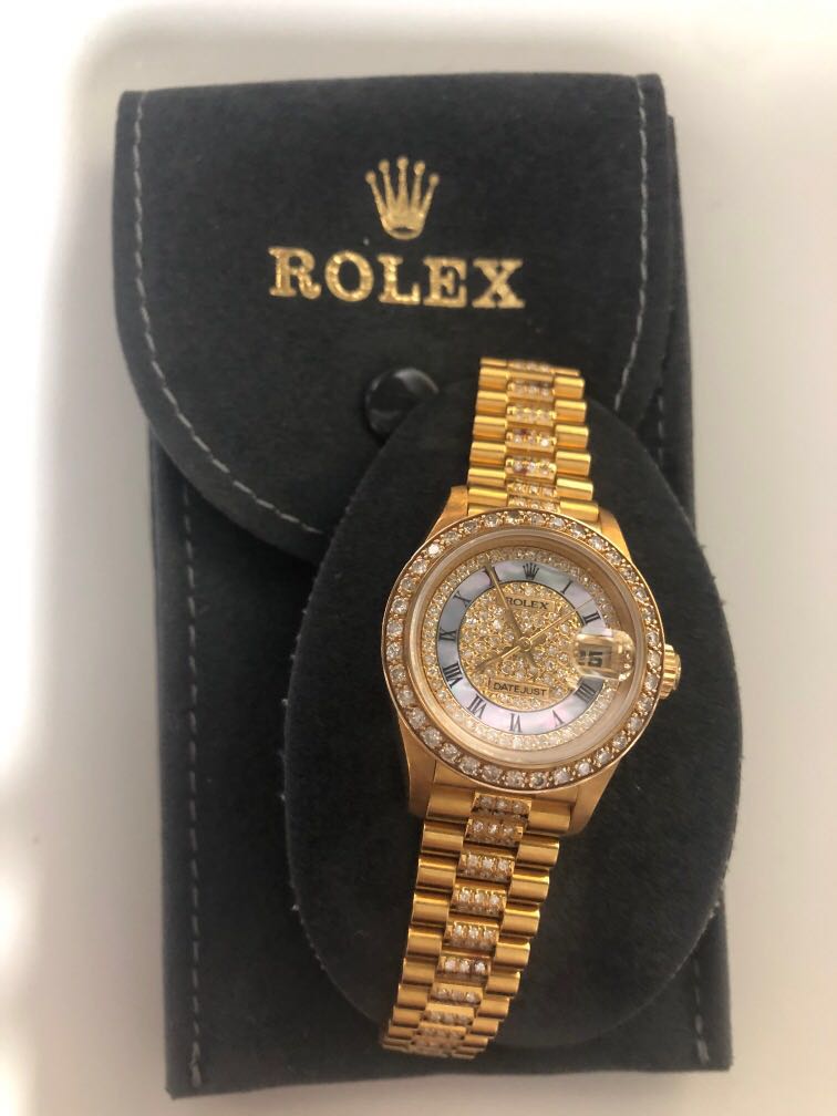 Gold diamond on sale rolex price