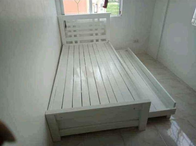 Wooden White Single Bed Frame w/ pullout bed. 09564751745 (Category: Bed Frames & Mattresses) located in Quezon City. Submitted by leocarloswoodcrafts (Listing ID 1168861620, Image 1). Description: made from solid mahogany wood, HINDI KASAMA FOAM. white color Price may change depending on size, design, wood type use, varnish and/or color. We also accept made to order / customized Wooden furnitures More available sizes (in inches) 36x75 Single siz