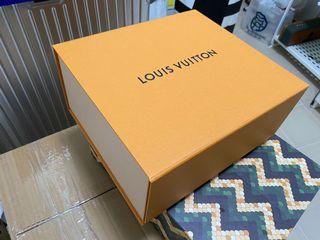 Louis Vuitton box with gift ribbon and paper bag