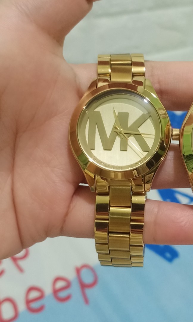 Mk watch face top