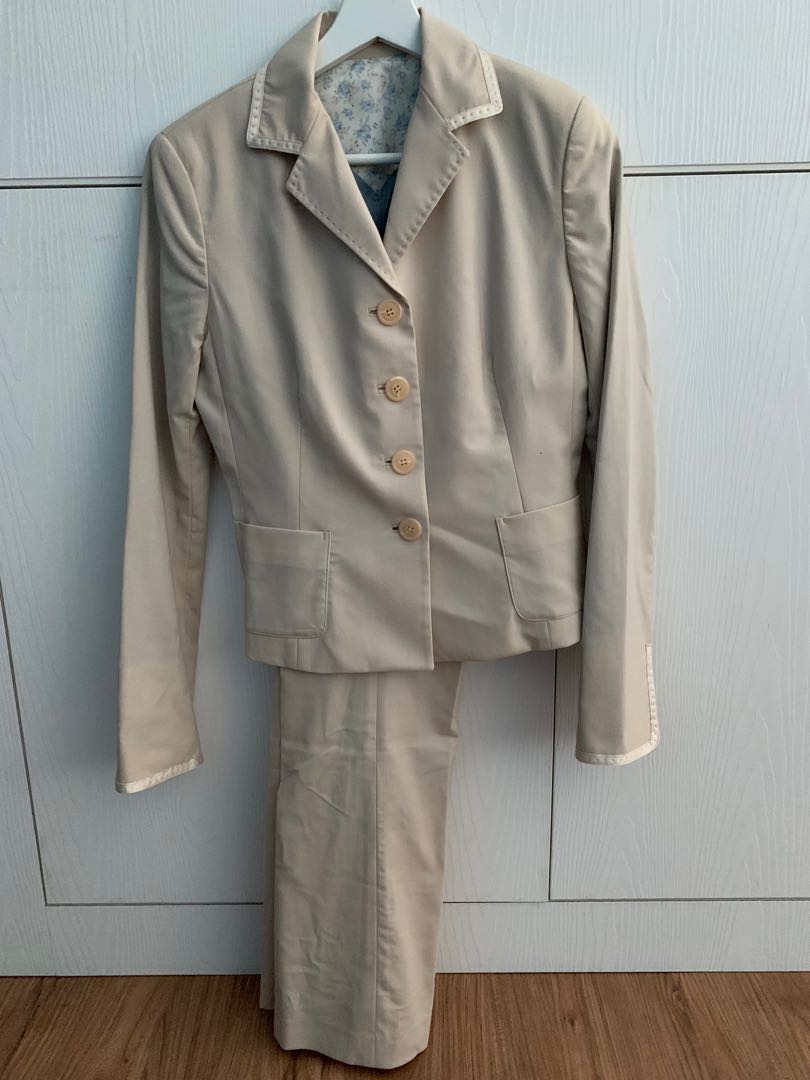 Beige jacket grey pants on sale