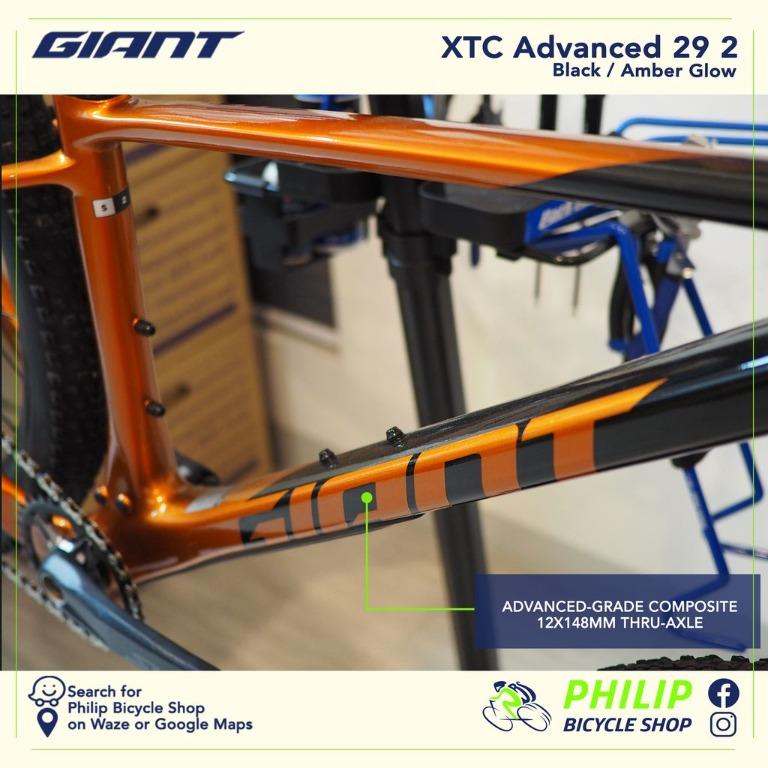 Giant XTC Advanced 2 Carbon Mountain Bike (Category: Bicycles) located in Quezon City. Submitted by phildc11 (Listing ID 1136615097, Image 3). Description: Condition: Brand New Brand: Giant Model: XTC Advanced 2 Colors and sizing: 29 M - Black Amber Glow 29 L - Black Amber Glow Year: 2022 Description: This bicycle is authentic and brand new. There have been no modifications or change of parts made. The specifications of this bike is exactly the s