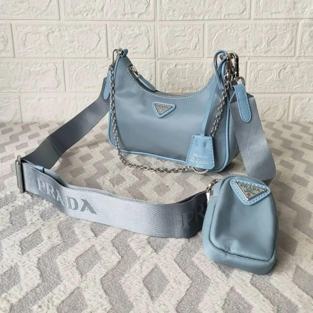 preloved tas prada re edition 2005 second nylon Barang Mewah Tas Dompet di Carousell