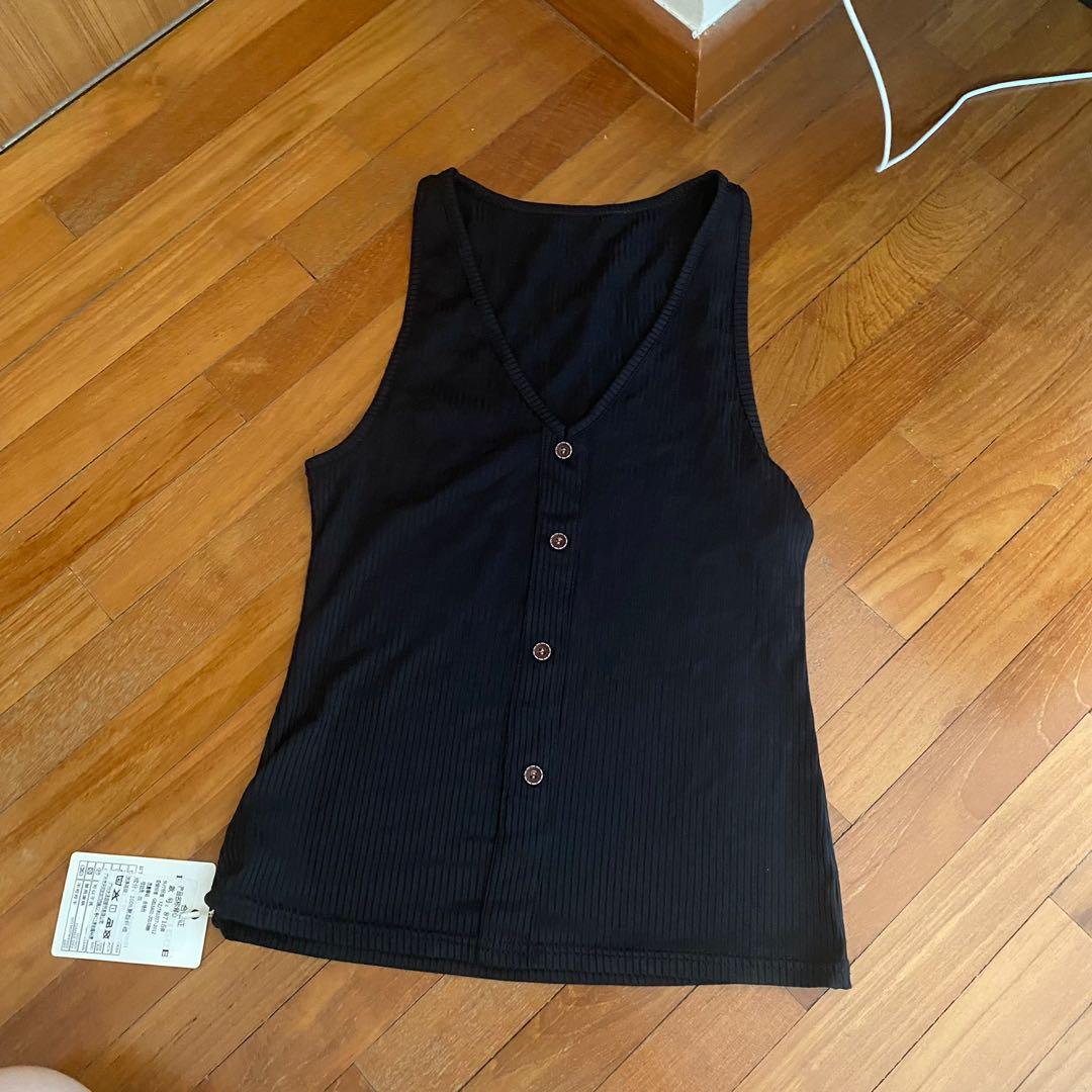 BNWT button down basic v neck top (Category: Sleeveless) located in Singapore. Submitted by marciewardrobe (Listing ID 1169521440, Image 1). Description: free size very stretchable overall POSTAGE only please, i provide video proof.