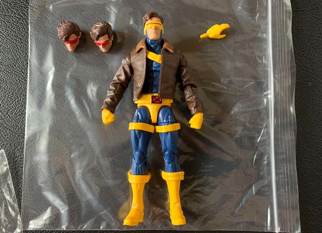 Marvel Legends Cyclops (Category: Figurines & Statues) located in Manila. Submitted by clark.kent1 (Listing ID 1169448270, Image 1). Description: Marvel legends Cyclops from 3 Pack Never been played just removed from the packaging Complete with extra heads and hand.