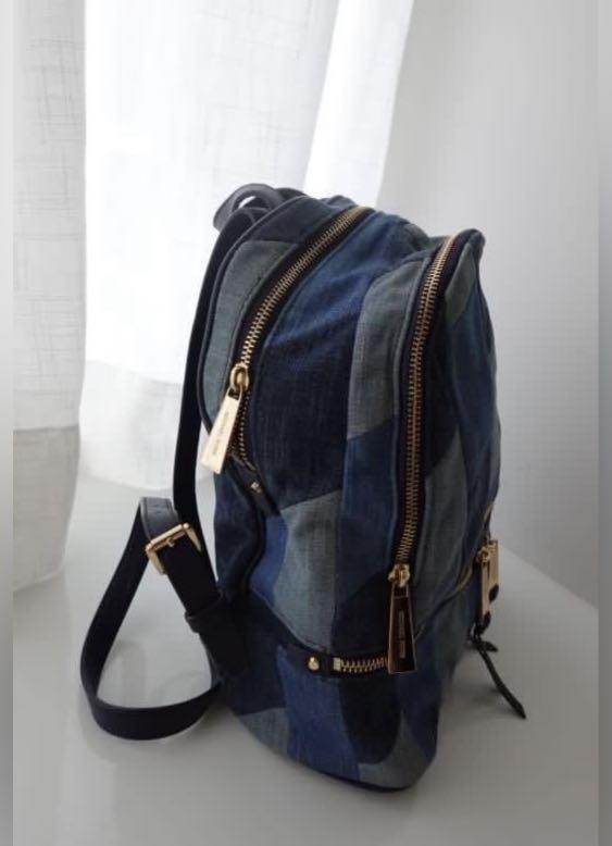 Michael kors denim backpack Carousell