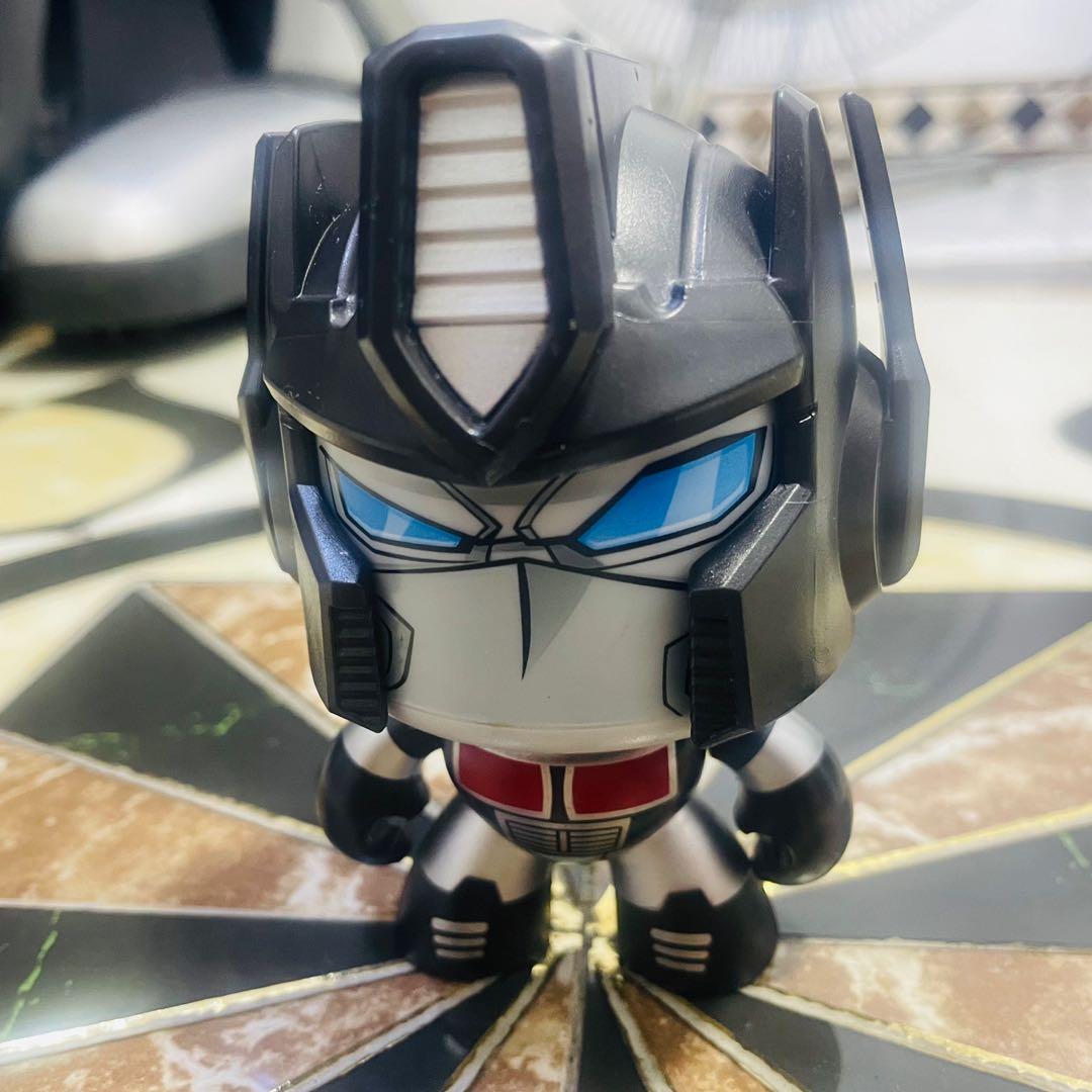 Nemesis prime mighty muggs (Category: Figurines & Statues) located in Makati City. Submitted by tomypom (Listing ID 1169606353, Image 2). Description: Mighty muggs Nemesis prime In very good condition Last pic for reference only 299php only!!! .