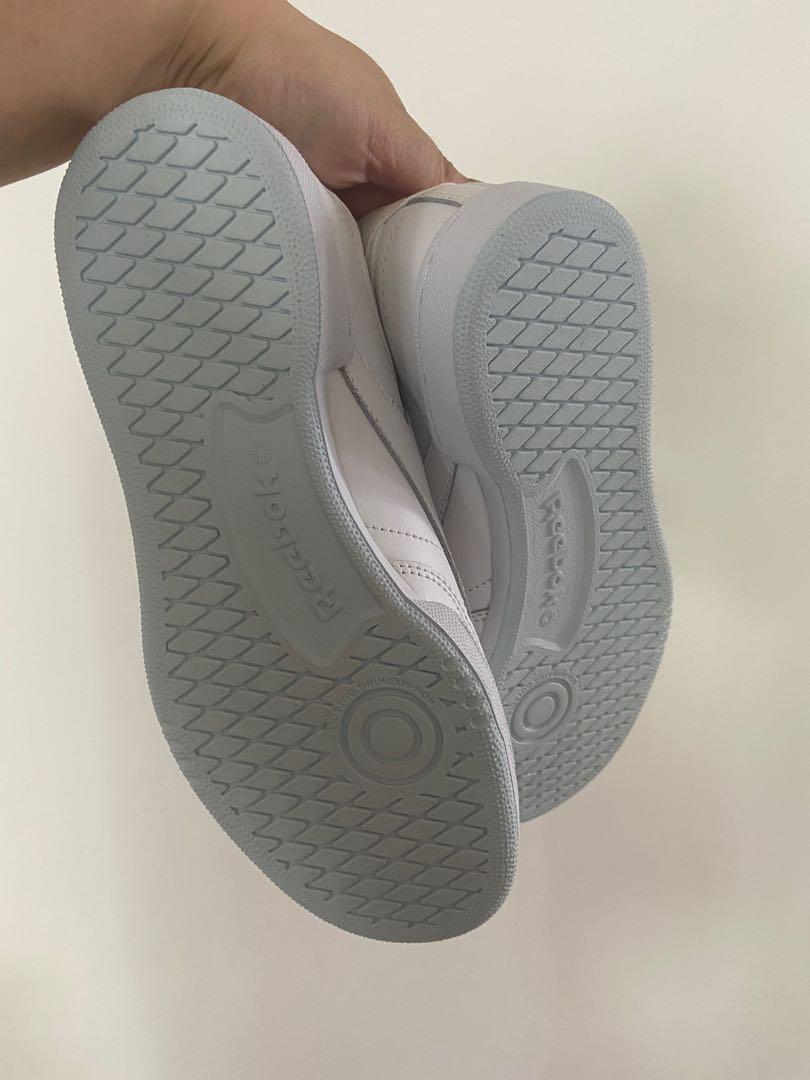 Reebok Club C white tennis shoes with sky blue soles