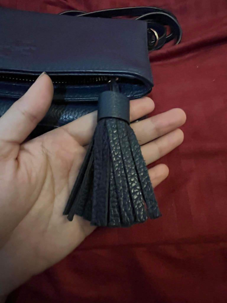 Tory Burch Mini Thea Foldover Crossbody (Category: Luxury Bags & Wallets) located in Quezon City. Submitted by hdelros (Listing ID 1164348996, Image 2). Description: used it for a few times original, with tag.