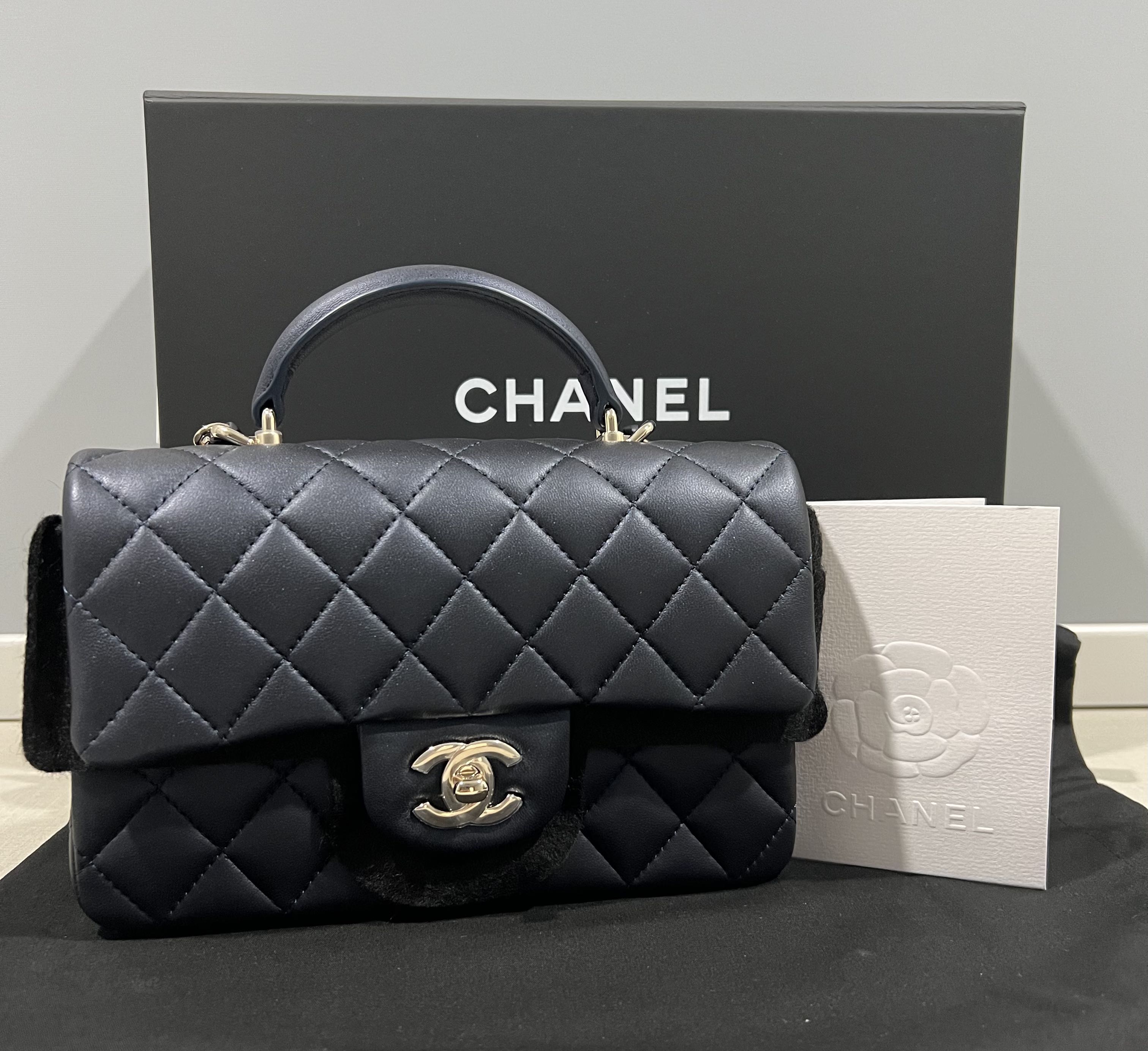 Chanel Mini Flap Bag with Top Handle in Dark Blue, Women's Fashion, Bags &  Wallets, Cross-body Bags on Carousell