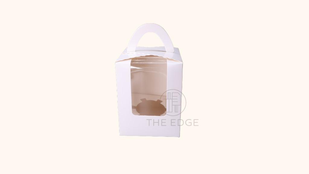 Cupcake Box Single w/ Holder (10pcs/pack) (Category: Bakeware) located in Pasig City. Submitted by kitchenstarincorporated (Listing ID 1169646328, Image 1). Description: Cupcake Box Single w/ Holder Qty, per pack: 10 pcs. Size: 9.5 x 9.5 x 11cm 1 hole cupcake box with handle and insert included - Detachable holes 10 pcs per pack Can fit up to 3oz cupcake Available in Blue, White & Pink.