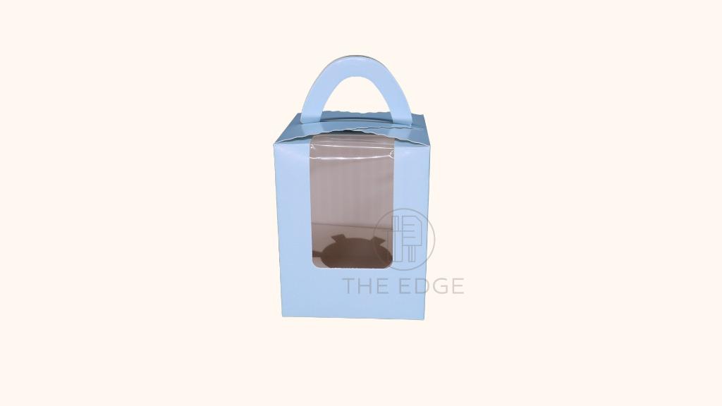 Cupcake Box Single w/ Holder (10pcs/pack) (Category: Bakeware) located in Pasig City. Submitted by kitchenstarincorporated (Listing ID 1169646328, Image 3). Description: Cupcake Box Single w/ Holder Qty, per pack: 10 pcs. Size: 9.5 x 9.5 x 11cm 1 hole cupcake box with handle and insert included - Detachable holes 10 pcs per pack Can fit up to 3oz cupcake Available in Blue, White & Pink.