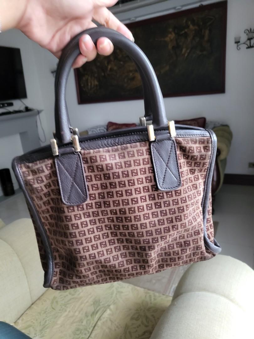 Fendi Vintage Small Hand Bag Authentic (Category: Luxury Bags & Wallets) located in Manila. Submitted by lp1216 (Listing ID 1169730350, Image 2). Description: Authentic Fendi Small Bag Vintage model Very cute and small (25cm length x 20cm height x 9cm base) All corners and leather piping are in good conditions No rubs & no open piping Bag interior in good condition Money back guarantee if proven fake Code imprinted of on the bag interior 77243 Ma