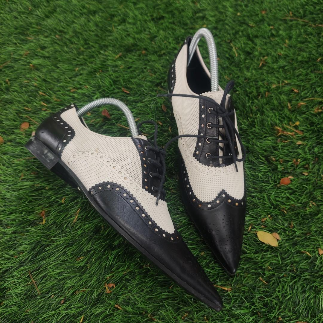 Gucci wingtip sales