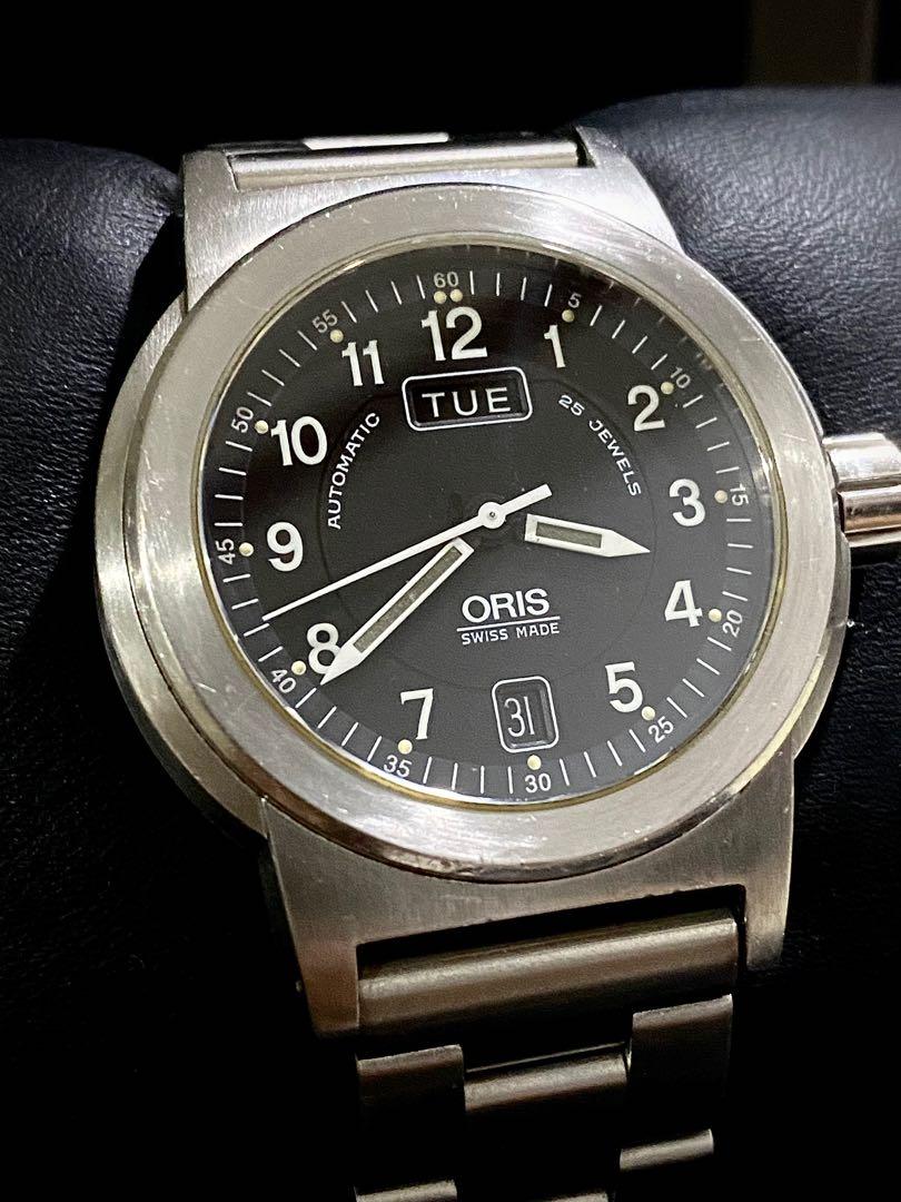 Oris Watch (Category: Men's Watches) located in Manila. Submitted by clicksmileph (Listing ID 1169755251, Image 2). Description: Oris Men's Watch 32,000 Php Details: Movement: Automatic Dial: Black Material: Silver Stainless Steel Case size: 40mm Condition: 8.5/10 All working condition Glass: Sapphire Crystal 12'0 Day Aperture - 6'0 Date Aperture 25 Jewels Swiss Made 50M Water Resistant Set with Watch Presentation box Certificate of Authenticity 