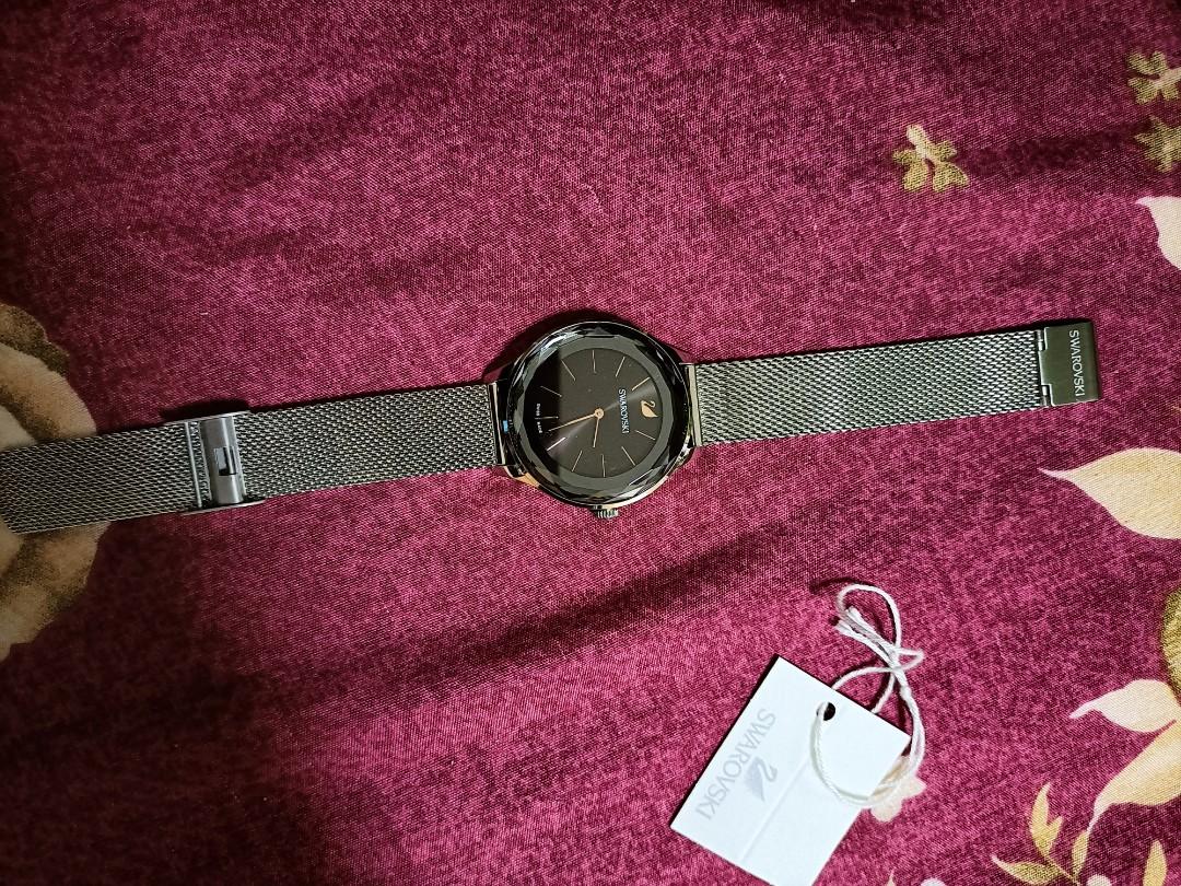 Swarovski swiss made authentic used bought from ion orchard seldom used like new unisex crystal stainless steel adjustable watch watches