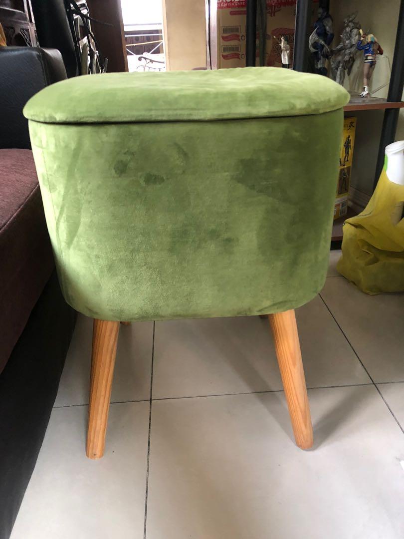 Accent Ottoman Storage Stool with broken cover (Category: Chairs) located in Quezon City. Submitted by lots2love (Listing ID 1164485700, Image 2). Description: Accent Ottoman Storage Stool with broken cover - Color: Light Green - Materials: Velvet fabric upholstery, wooden feet - Used only as toy storage for my nephew who seldom visits - Issue: Inner board of top cover got broken (cracked on one side) when a heavy built adult sat on it with only 