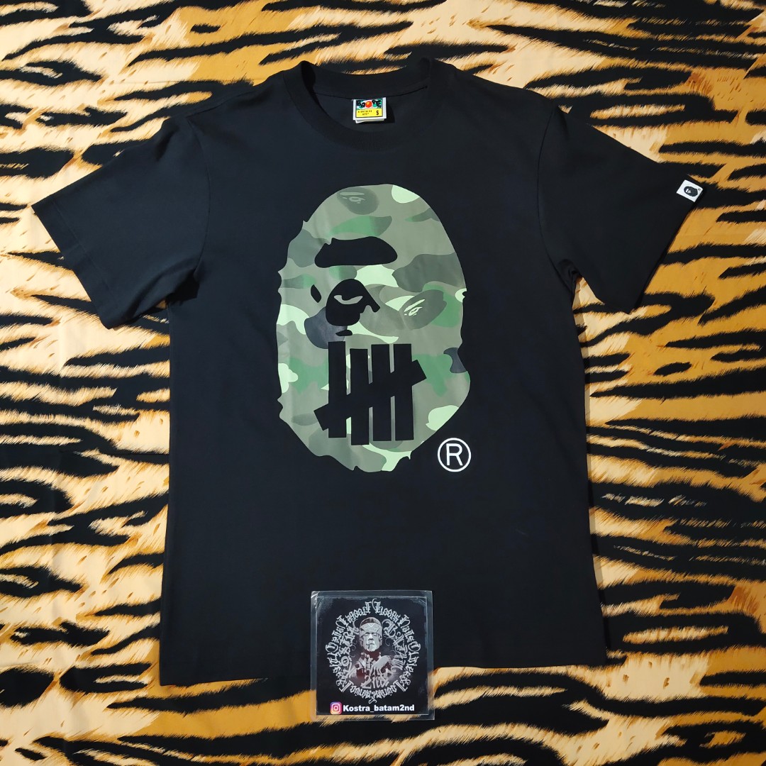 Bape x undefeated tee Fesyen Pria Pakaian Atasan di Carousell