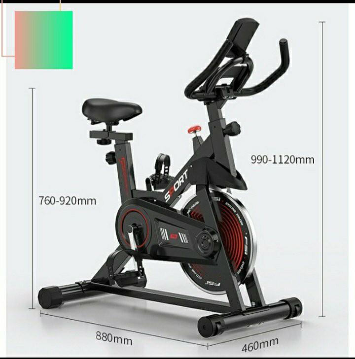 Compact indoor spin exercise bike with adjustable seat for home