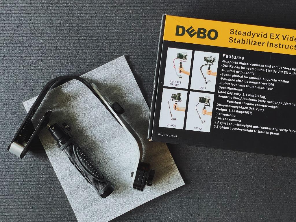 Debo Steadyvid EX Video Stabilizer (Category: Gimbals & Stabilizers ) located in Mandaluyong City. Submitted by _banandi (Listing ID 1164557964, Image 1). Description: DEBO STEADYVID EX VIDEO STABILIZER ✦ bought for ₱1,550 at L/azada ! ✦ purchased for video work but focused on photography instead ✦ great for small-sized and light cameras ✦ includes original box packaging as pictured above —— rfs : decluttering ! —— pls send message for more detai