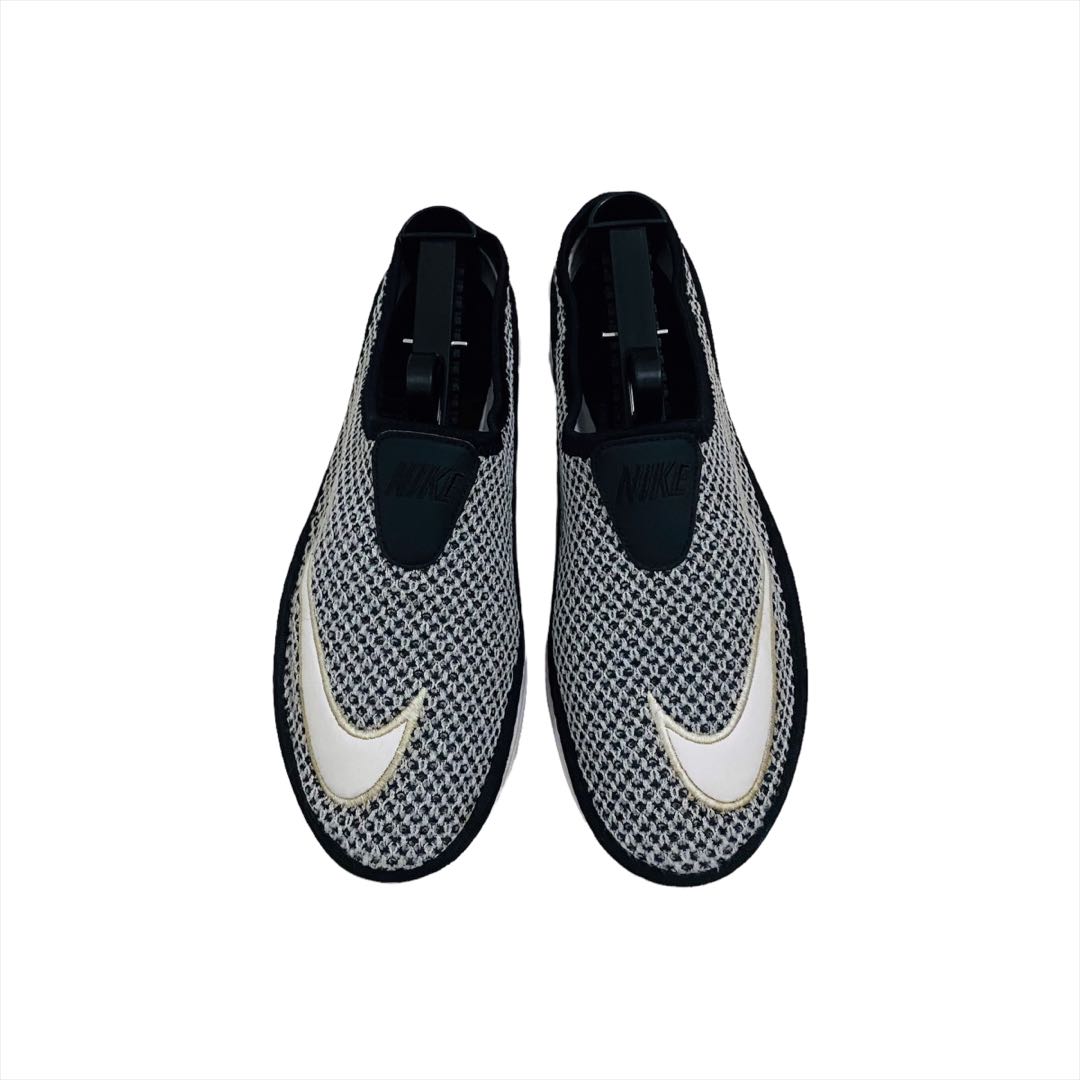 Nike solarsoft slip on store