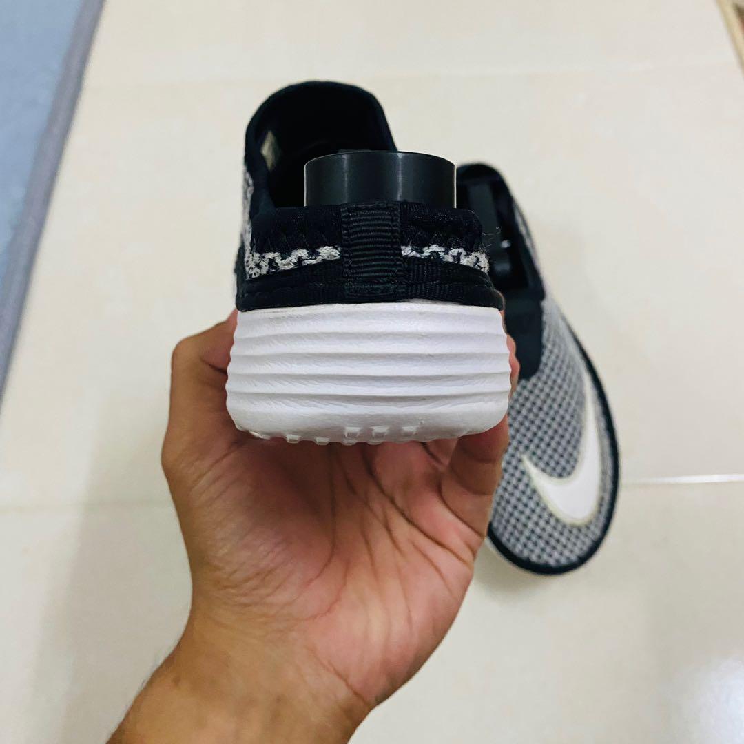 Nike Solarsoft Slip On Men s Fashion Footwear Flipflops and