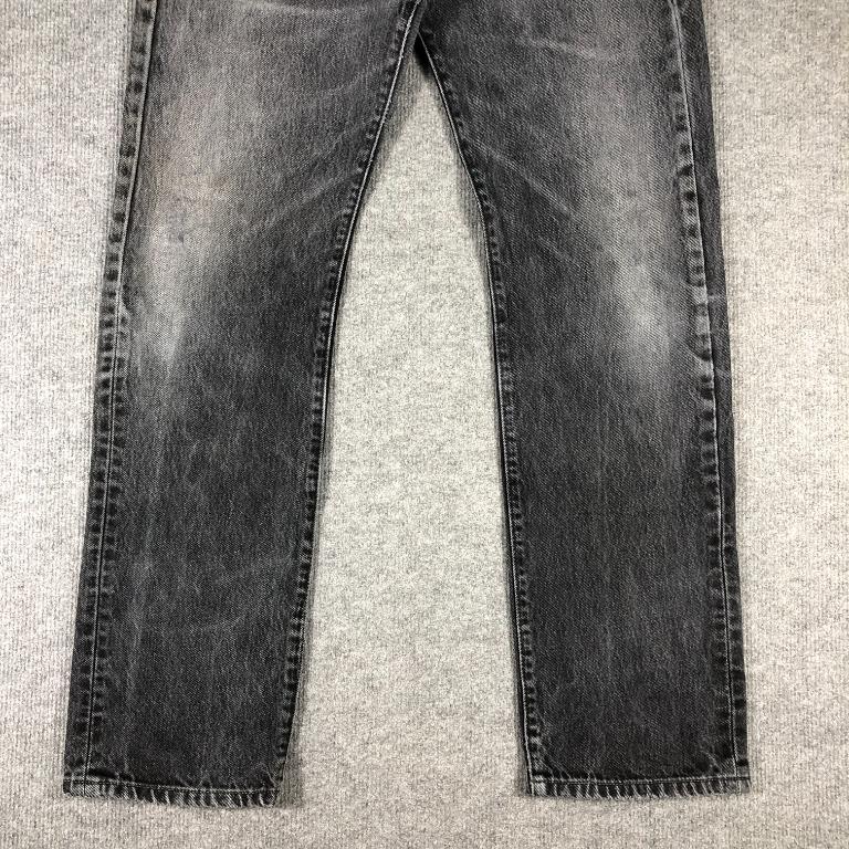 Vintage Levis 501 Fly Button Faded Black Jeans, Men's Fashion, Bottoms,  Jeans on Carousell