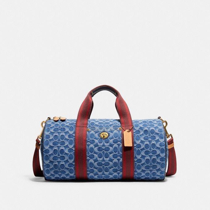 Coach denim barrel best sale bag