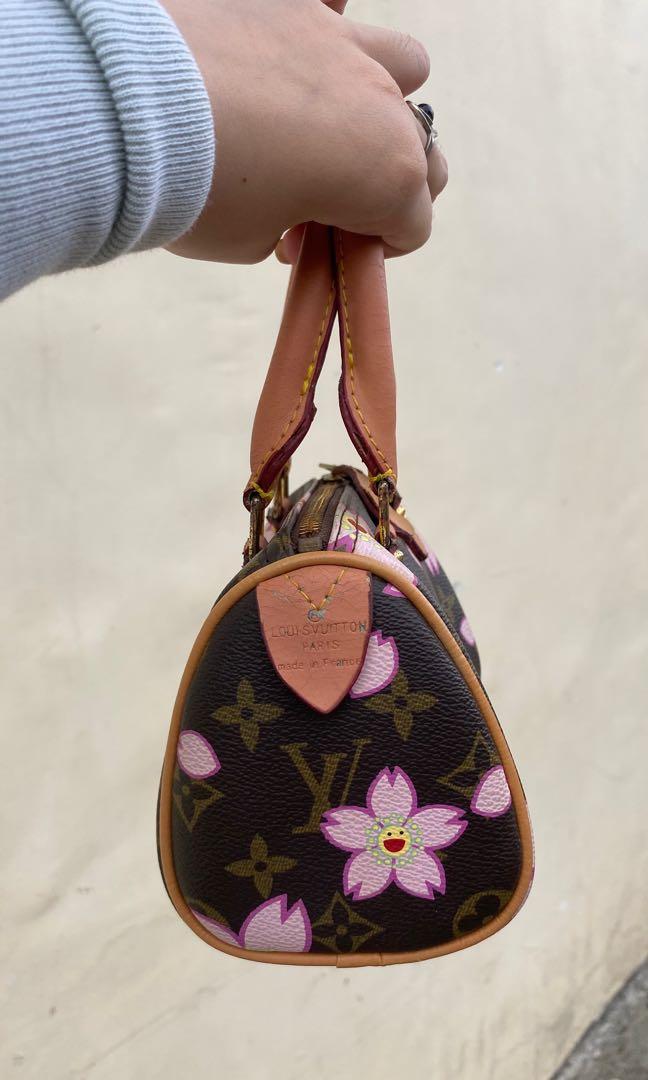L V takashi murakami speedy mini bag (Category: Luxury Bags & Wallets) located in Pasig City. Submitted by luxdyneeds (Listing ID 1164756355, Image 3). Description: - nga (super rare & hard to find) - sign of usage, message me for more deets - mini & very expensive 🥺 - y2k & classy at the same time - 2000s bag, worn by many celebrities .