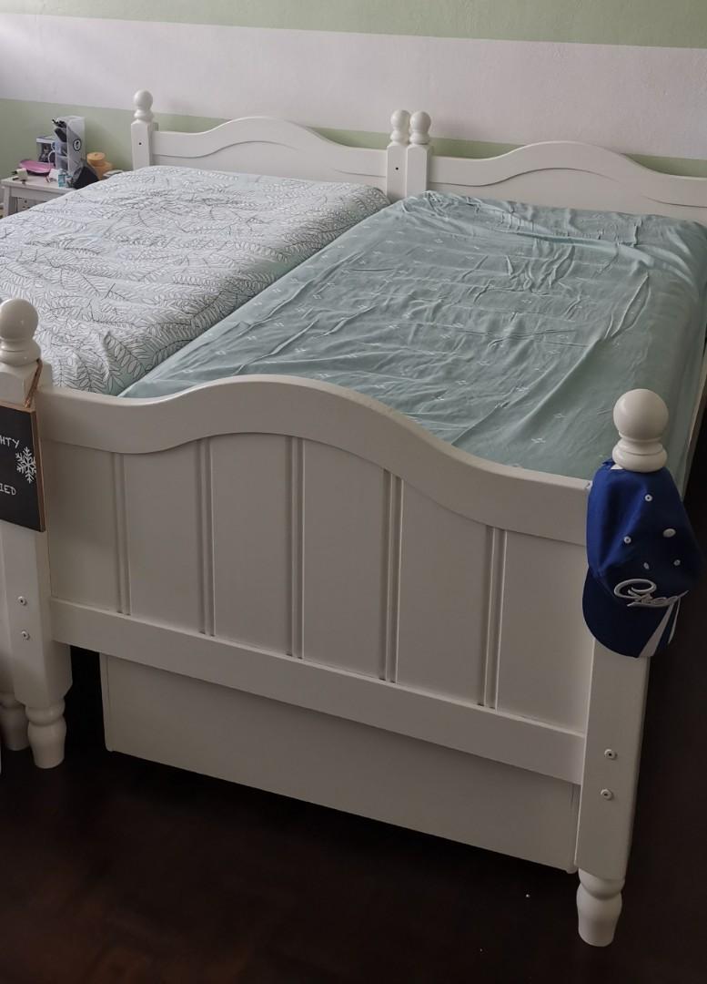 Set of two white twin beds including trundle but no mattresses, Babies