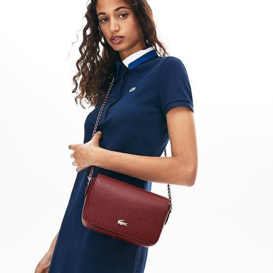 Authentic Lacoste Chantaco sling bag (with Dustbag) (Category: Luxury Bags & Wallets) located in Pasig City. Submitted by jagg_shop (Listing ID 1164914356, Image 2). Description: Original Price: P13k+ -Fabric: 100% cow leather -one outer pocket -one inner compartment -fine strip with interlacing element -dimensions: 15 x 20.5 x 8 cm.