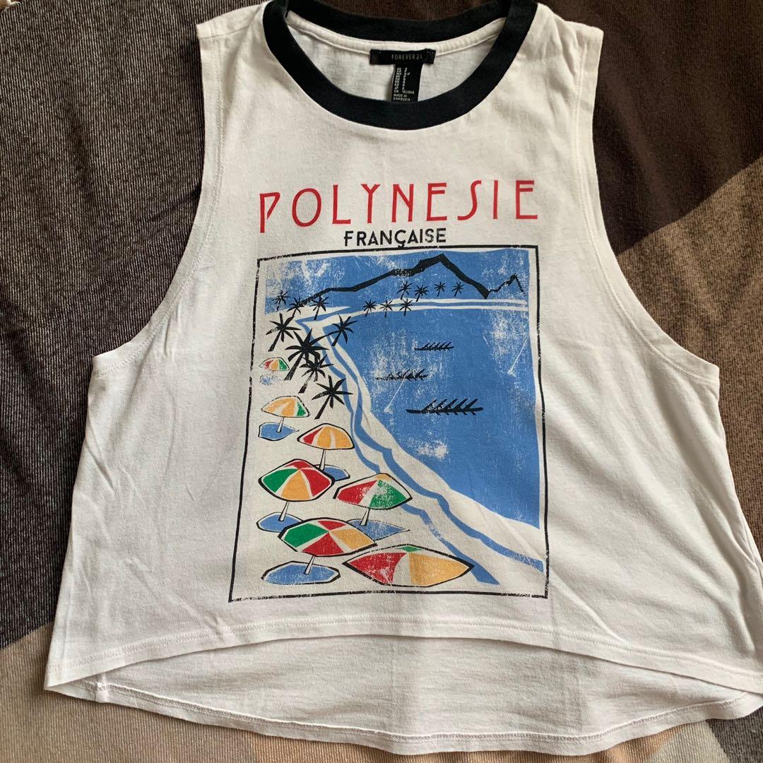 Forever 21 Polynesie sleeveless top (Muscle type) (Category: Sleeveless) located in Taytay. Submitted by ccarci (Listing ID 1164893414, Image 1). Description: - Loose sleeveless Measurement (tape measure in flat surface) -width body area: 20 in. - width chest area: 12.5 in. - Length front: 18 in. - Length back: 21 in. Issue: Print.
