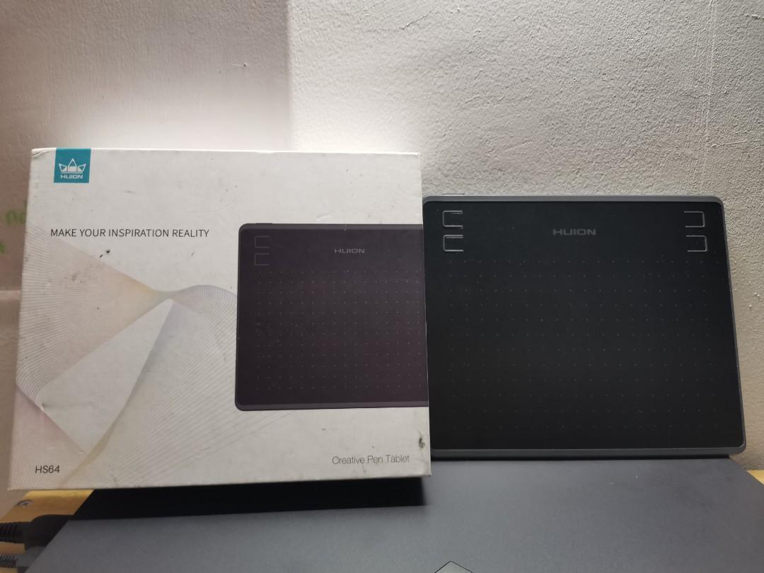 Huion HS64 Digital Graphics Drawing Tablet (Category: Other Gadgets) located in Caloocan City. Submitted by cleooo_ (Listing ID 1164970941, Image 1). Description: Huion HS64 Drawing Tablet with gloves (Second hand with few minor scratches) 8192 Battery free stylus -Huion HS64 Drawing Tablet with box -Battery free Pen PW100 -Micro USB cable -8 extra pen nibs -OTG Adapter OTG Adapter (USB-C) -1 Pen Nib clip -Quick start guide *bought FOR PHP 1,400 