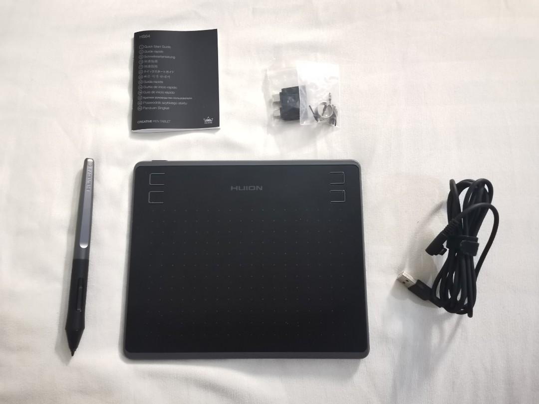Huion HS64 Digital Graphics Drawing Tablet (Category: Other Gadgets) located in Caloocan City. Submitted by cleooo_ (Listing ID 1164970941, Image 2). Description: Huion HS64 Drawing Tablet with gloves (Second hand with few minor scratches) 8192 Battery free stylus -Huion HS64 Drawing Tablet with box -Battery free Pen PW100 -Micro USB cable -8 extra pen nibs -OTG Adapter OTG Adapter (USB-C) -1 Pen Nib clip -Quick start guide *bought FOR PHP 1,400 