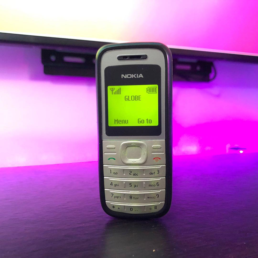 Nokia 1200 | Vintage Phone (Category: Early Generation Mobile Phones) located in Lipa City. Submitted by slicksmithtechnology (Listing ID 1164938249, Image 1). Description: Brand New Quality Nokia 1200 Openline, any SIM card will work. Perfect for texting, calling, eloading business, and as a phone backup. It has long battery life thanks to the phone’s super efficient processor and higher battery capacity. FEATURE HIGHLIGHTS: • Flashlight • Tacti