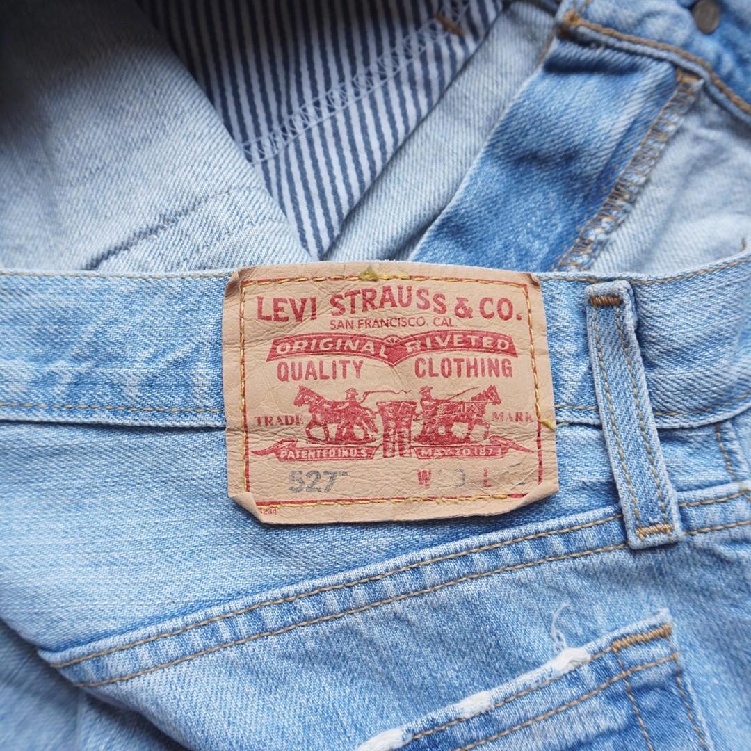 Raree Levis 527 Low boot cut, double red tab, Fesyen Pria, Pakaian ,  Bawahan di Carousell