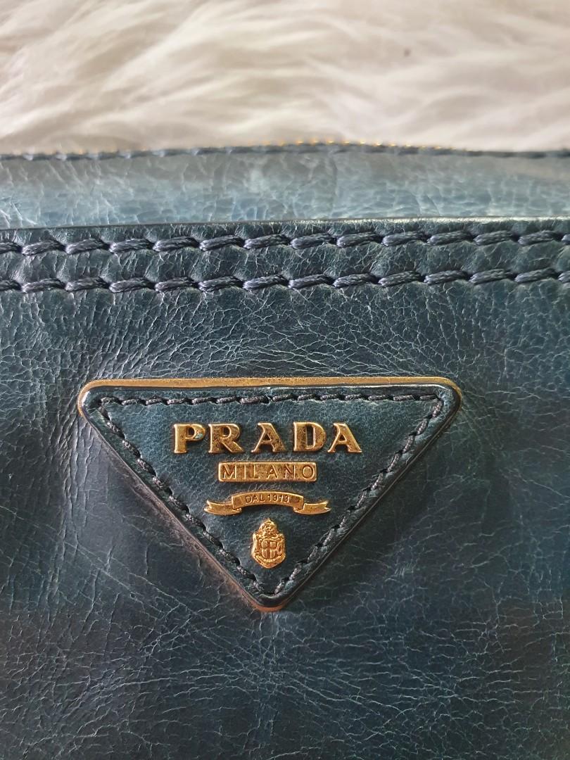 Authentic Prada Pouch / Sling Bag (Category: Luxury Bags & Wallets) located in Malolos. Submitted by yamaguchionline (Listing ID 1165087501, Image 2). Description: SALE❗️❗️❗️ Authentic Prada Pouch / Sling Bag Bought in Japan Guaranteed authentic Money back With Card Preloved Issue : original Pouch sya pinalagyan namin ng sabitan magkabilang gilid para maging sling Please respect my ads❣️ Thank you.