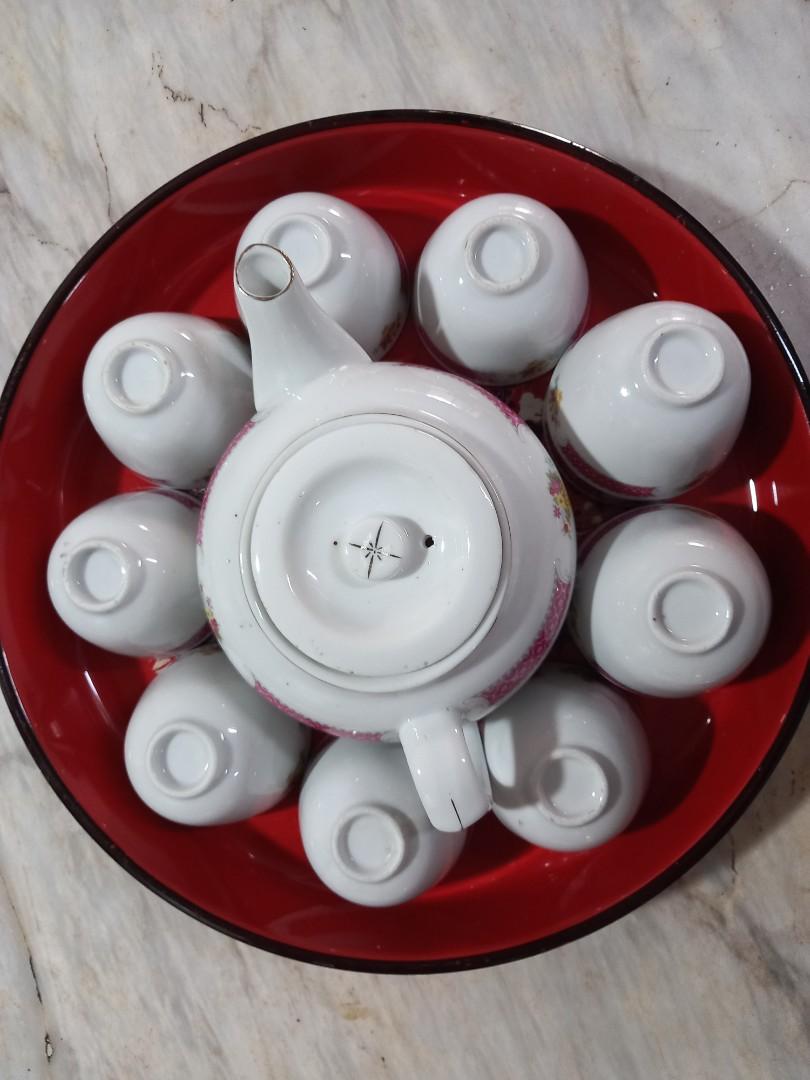 Engagement Tea Set with 12 Cups (Category: Coffee & Tea Tableware) located in Quezon City. Submitted by ajc___ (Listing ID 1165108665, Image 1). Description: Used once only Teapot with 12 tea cups Discoloration on some tea cups (gilded lines, see last 3 photos) Will secure properly if for delivery Negotiable.