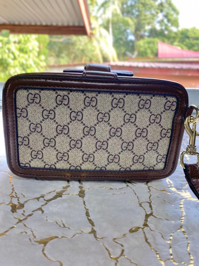 Gucci gg mini best sale bag with clasp closure