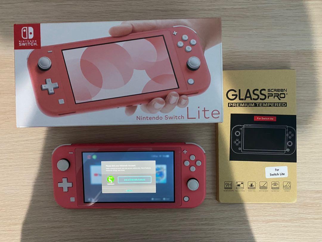 NINTENDO SWITCH LITE CORAL EDITION (USED), Video Gaming, Video Game  Consoles, Nintendo on Carousell