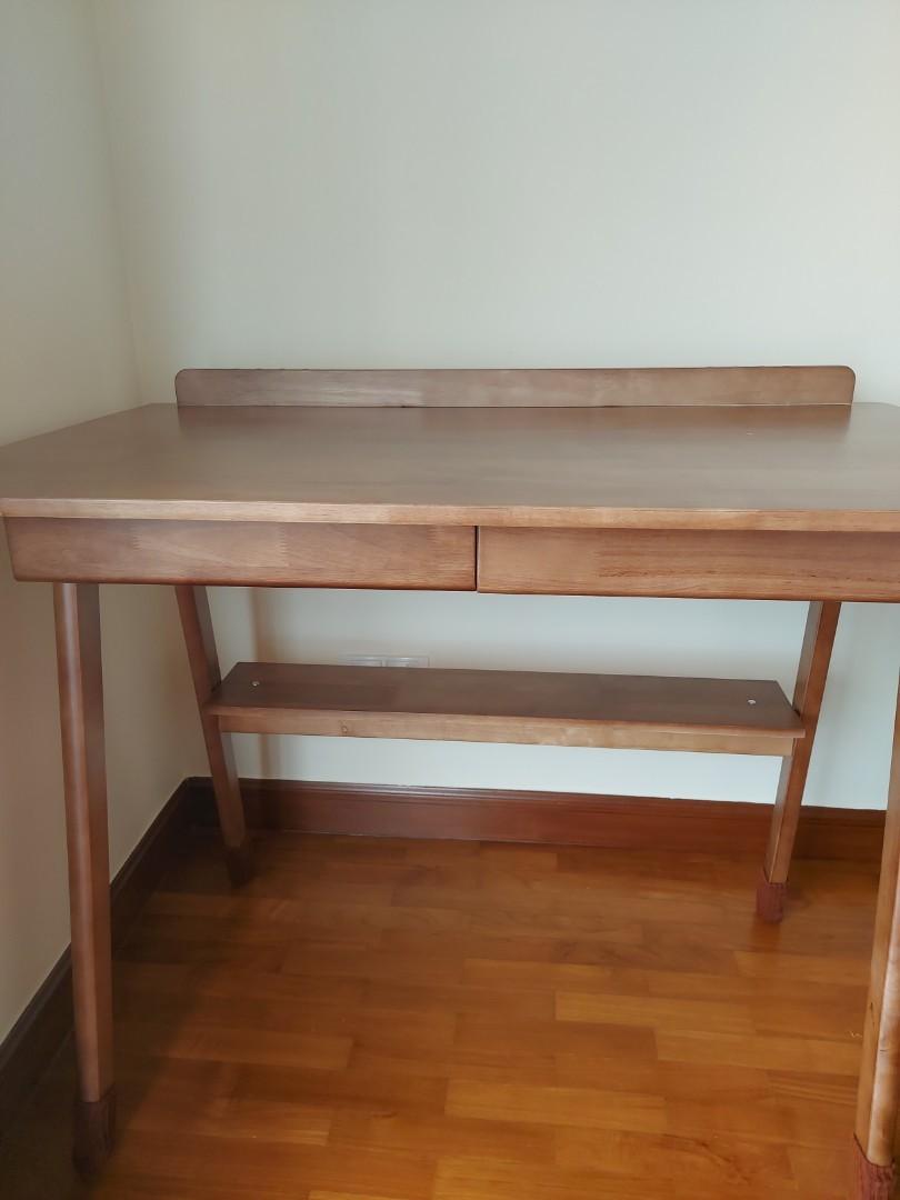 Study Table (solid wood) (Category: Tables & Sets) located in Singapore. Submitted by sz2012 (Listing ID 1165166773, Image 1). Description: 600mm (d) x 1000mm (w) Full solid wood.