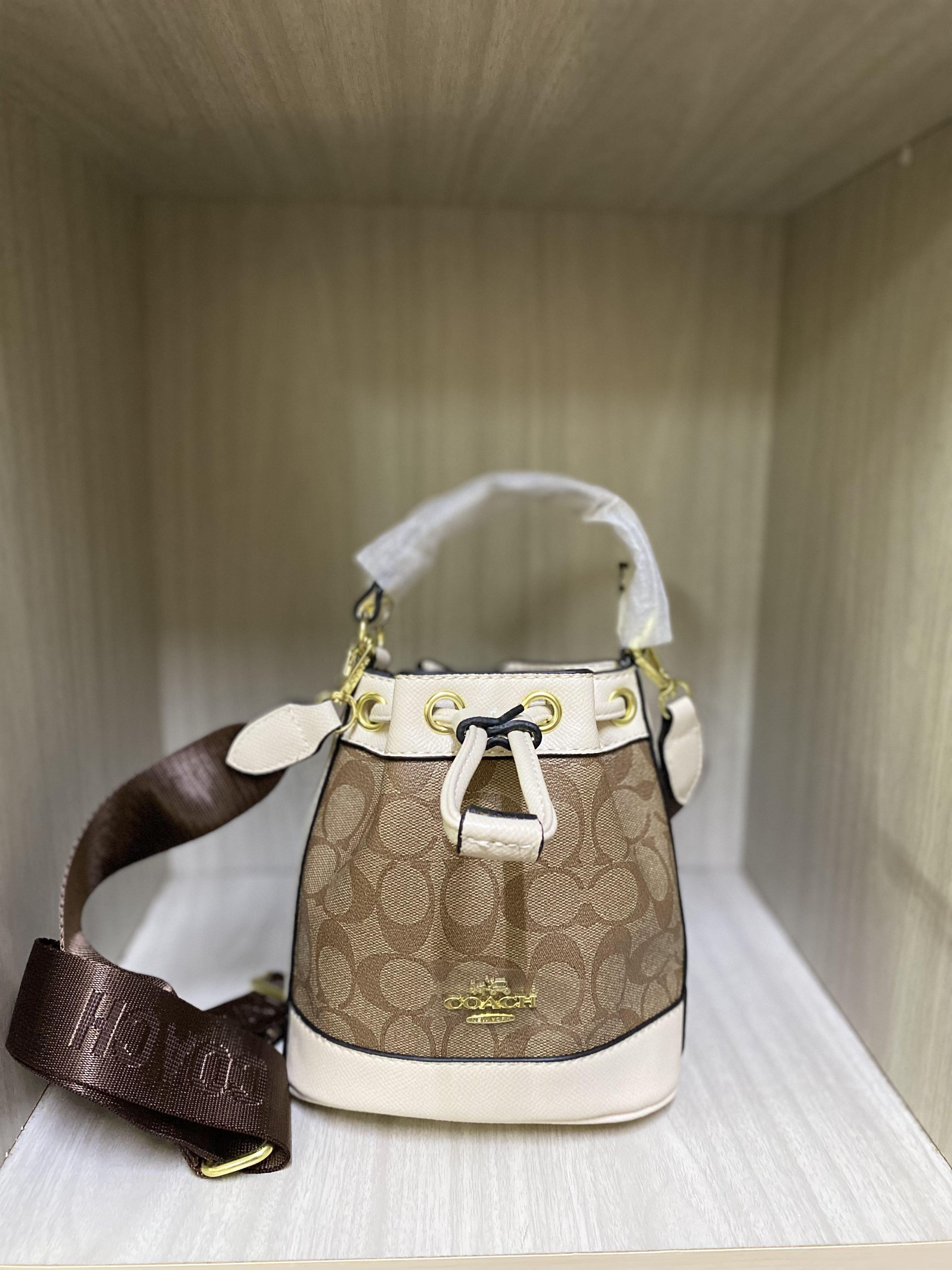 Coach bucket shop sling bag