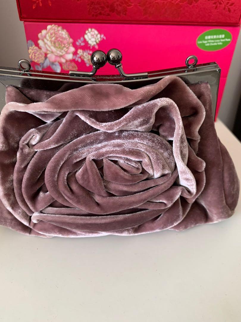 Fenn Wright Manson a U.K. designer. A dusky pink velvet evening or day bag. Gunmetal hardware